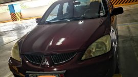 Selling Red Mitsubishi Lancer 2007 Automatic Gasoline 
