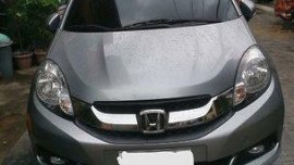 Selling Silver Honda Mobilio 2016 at 14000 km 