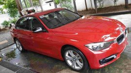Red Bmw 320D 2013 at 19500 km for sale 