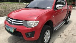 Red 2013 Mitsubishi Strada Truck at 24000 km for sale 