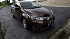 Sell Brown 2014 Toyota Corolla Altis Automatic Gasoline 