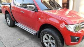 Sell Red 2014 Mitsubishi Strada at 92000 km