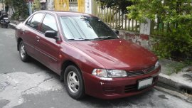 Selling Red Mitsubishi Lancer 1997 Sedan in Quezon City 