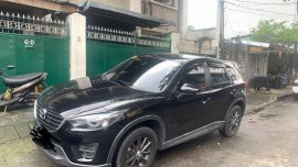 Black Mazda Cx-5 2016 at 32000 km for sale 