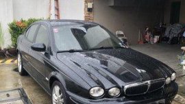 Black Jaguar X-Type 2008 at 12000 km for sale