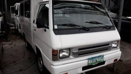 Selling White Mitsubishi L300 2012 Manual Diesel in Quezon City 