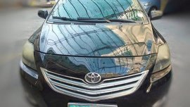Black Toyota Vios 2013 at 70000 km for sale 