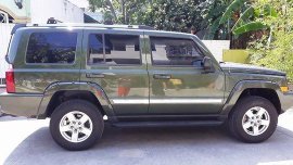 Green Jeep Commander 2008 at 109000 km for sale 