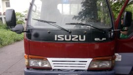 Selling Red Isuzu Elf 2009 Truck in Cavite 