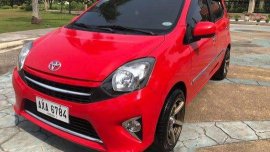 Red Toyota Wigo 2015 for sale in Cebu 