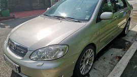 Selling Beige Toyota Corolla Altis 2005 