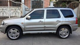 Selling Silver Mazda Tribute 2004 at 82000 km