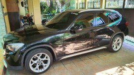 Selling Black Bmw X1 2011 at 20000 km 