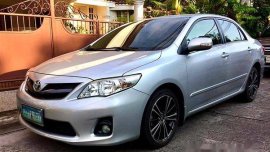 Silver Toyota Corolla Altis 2013 Manual Gasoline for sale