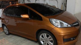 Orange Honda Jazz 2013 Automatic Gasoline for sale