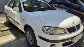 Selling White Nissan Sentra 2003 Automatic Gasoline at 157000 km