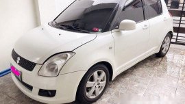 White Suzuki Swift 2010 at 61817 km for sale