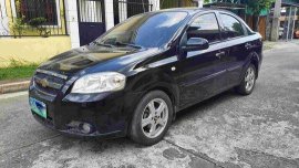 Selling Black Chevrolet Aveo 2012 Automatic Gasoline 