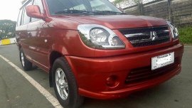 Red Mitsubishi Adventure 2015 at 23000 km for sale 