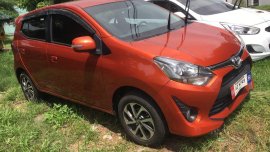Orange Toyota Wigo 2018 for sale in Cainta