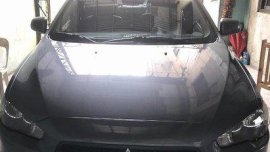 Grey Mitsubishi Lancer Ex 2010 Automatic Gasoline for sale 