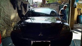 Selling Black Mitsubishi Lancer 2010 Manual Gasoline at 115000 km 