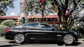 Selling Black Bmw 730Li 2014 at 80000 km 