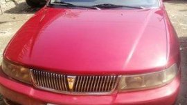 Selling Red Mitsubishi Lancer 2001 Manual Gasoline 