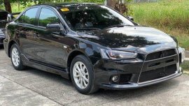 Selling Black Mitsubishi Lancer Ex 2014 at 21916 km 
