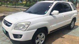Selling White Kia Sportage 2009 in Talisay