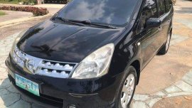 Selling Black Nissan Grand Livina 2009 at 1 km