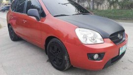 Orange Kia Carens 2007 for sale in Talisay