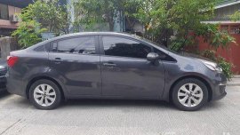 Selling Grey 2016 Kia Rio at 24500 km