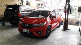 Red Honda Jazz 2015 at 35000 km for sale