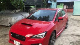 Red Subaru Wrx 2015 at 21000 km for sale 