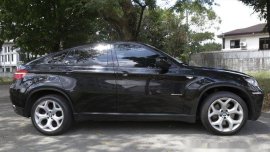 Selling Black Bmw X6 2011 Automatic Gasoline at 51000 km
