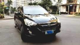 Black Hyundai Tucson 2011 at 37000 km for sale 