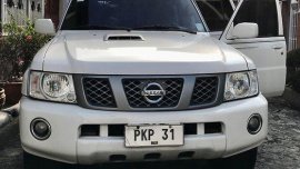 White Nissan Patrol 2013 at 157000 km for sale 