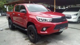 Red Toyota Hilux 2016 at 20000 km for sale