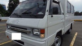 White Mitsubishi L300 2014 for sale in Quezon City 
