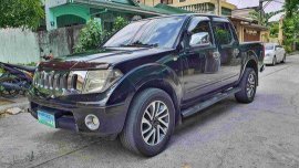 Black Nissan Frontier navara 2010 Automatic Diesel for sale 