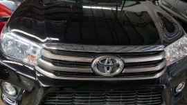 Black Toyota Hilux 2018 for sale in Quezon City
