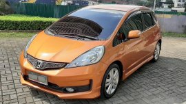 Selling Orange Honda Jazz 2013 in Manila