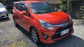 Orange Toyota Wigo 2019 for sale in Quezon City