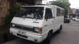 Selling White Mitsubishi L300 2002 in Paranaque