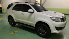 Pearl White Toyota Fortuner 2013 for sale in Makati