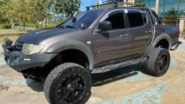 Sell Grey 2010 Mitsubishi Strada in Talisay