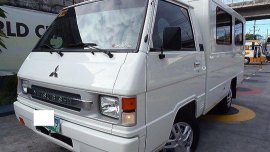 Selling White Mitsubishi L300 2014 in Quezon City