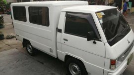 Selling White Mitsubishi L300 2013 in Quezon City