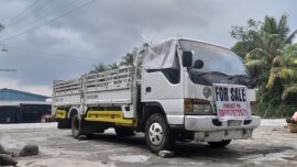 White Isuzu Elf 1997 for sale in Digos